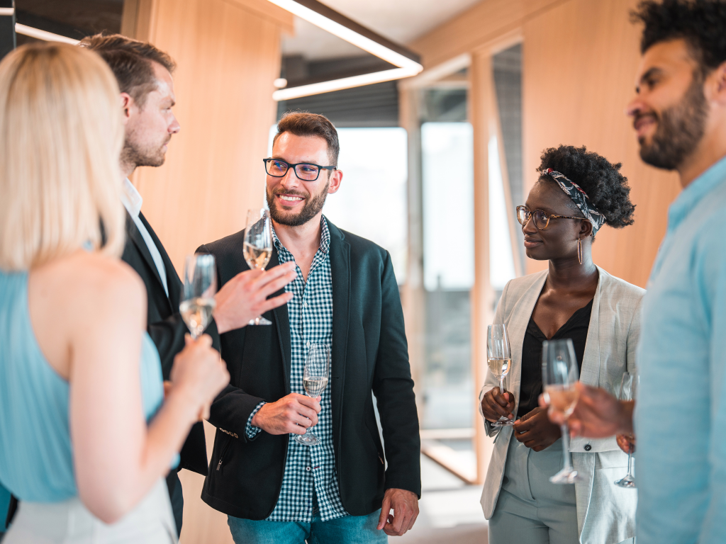 Colleagues enjoying drinks from our corporate event bar hire service.